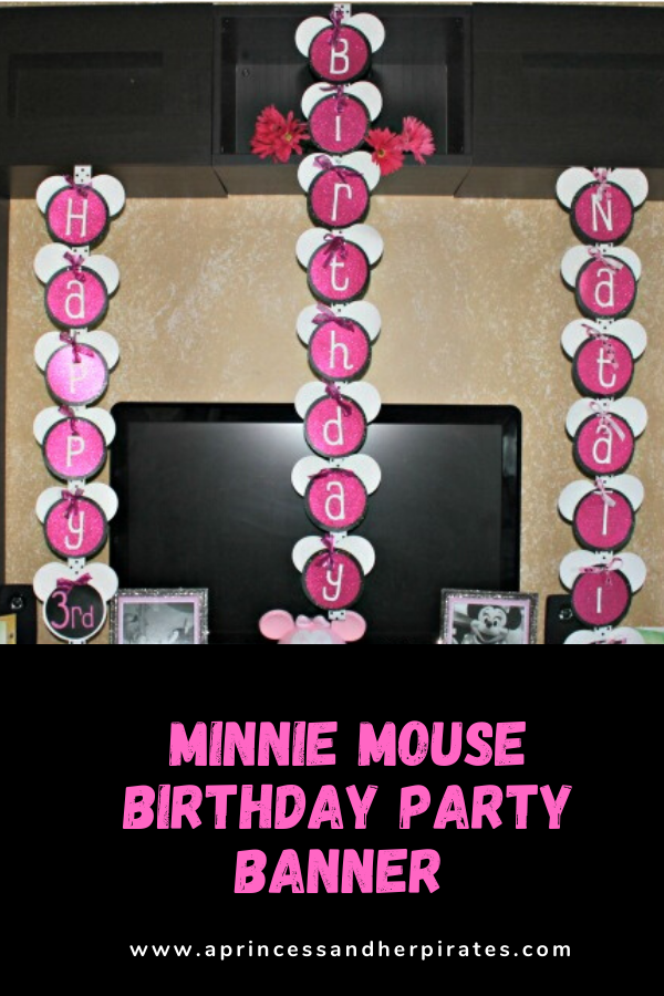 Use card stock, a Cricut, and some glue to make this cute #MinnieMouse banner. #minniemouseparty #minniebirthday #disneybirthdayparty